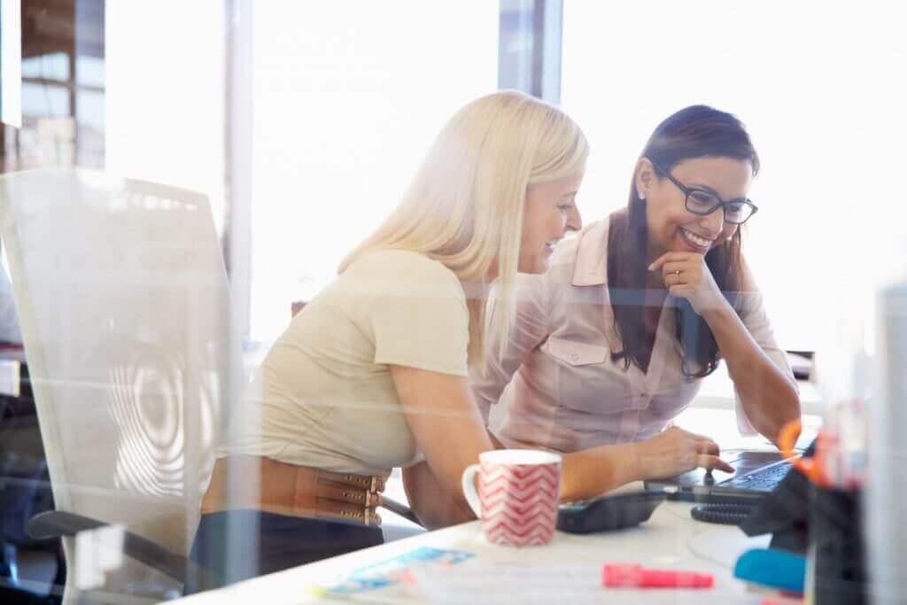 employee mentoring a peer